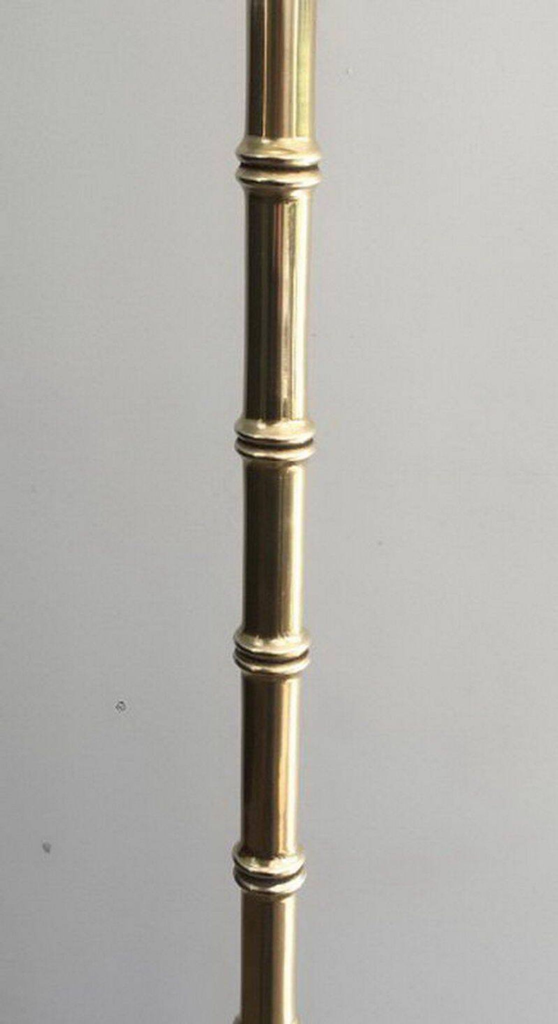 Floor lamp in faux-bamboo style, made of bronze and brass by Jacques Adnet