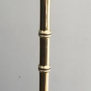 Floor lamp in faux-bamboo style, made of bronze and brass by Jacques Adnet