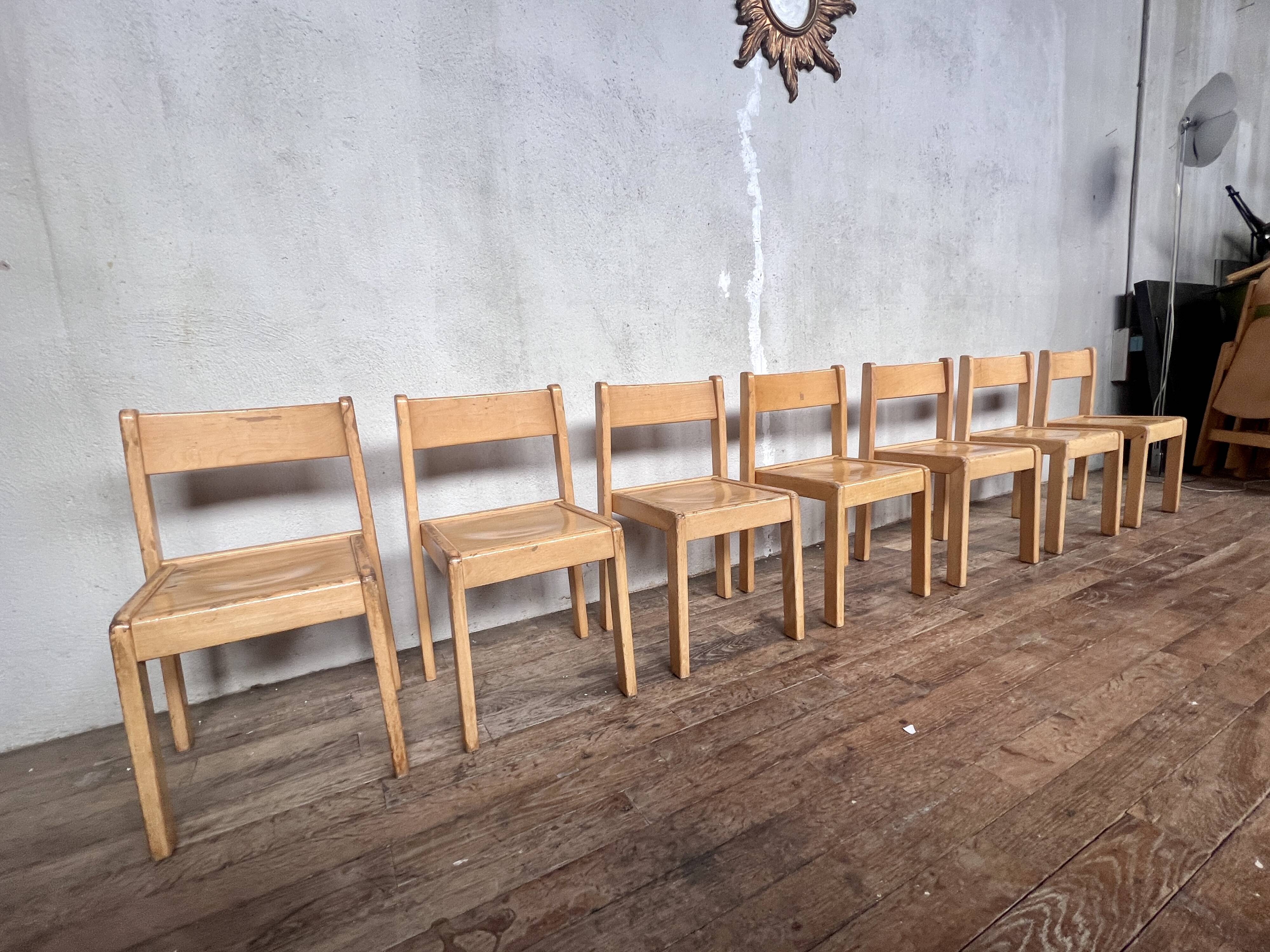 Series of 7 vintage Scandinavian bohemian wooden children's chairs