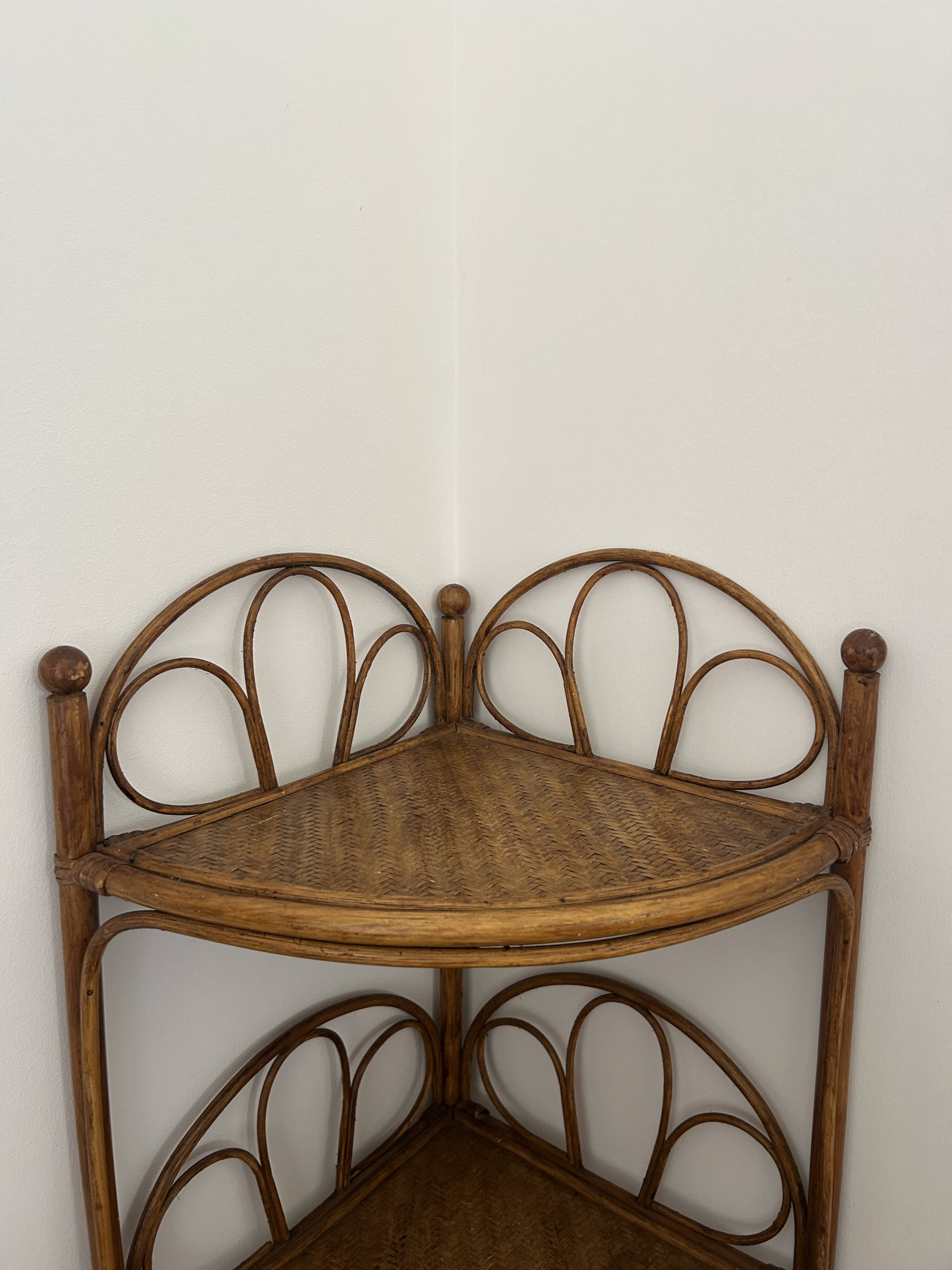 Corner bedside tables in rattan