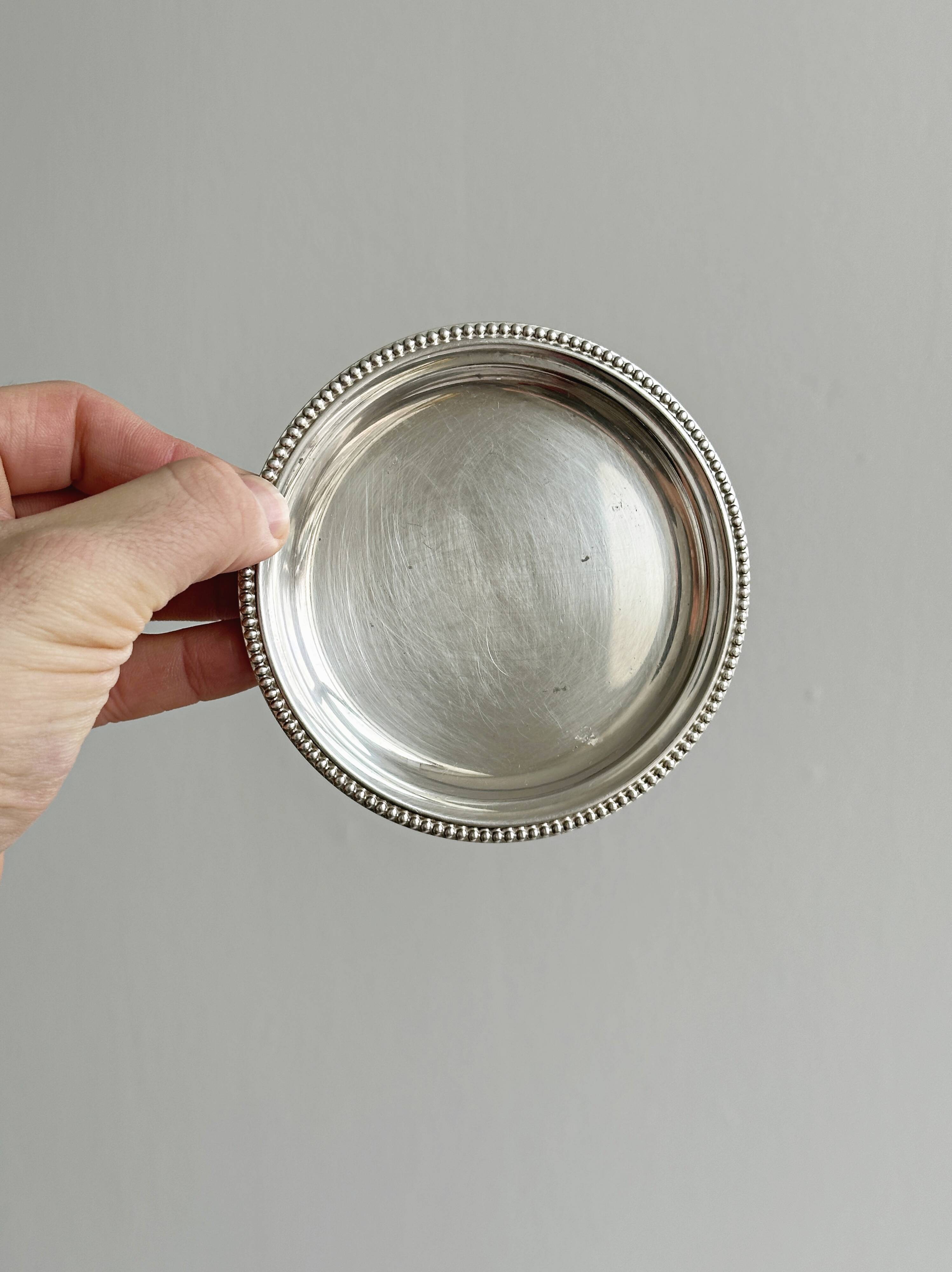 Set of 2 round beaded metal bowls