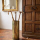 Vintage umbrella stand in patinated shell casing