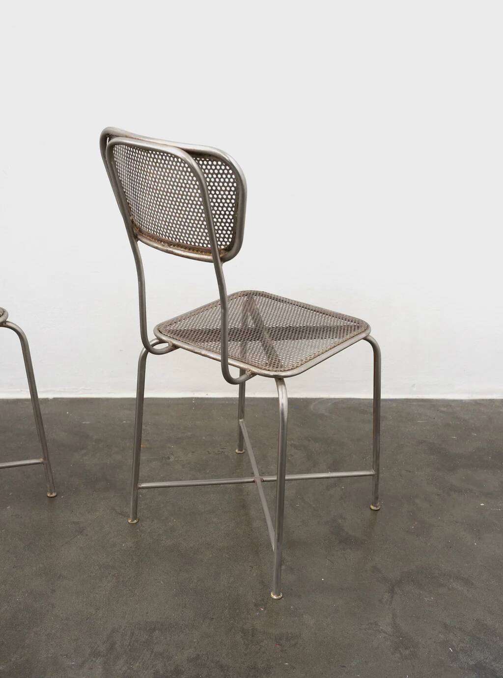 Vintage perforated metal chairs