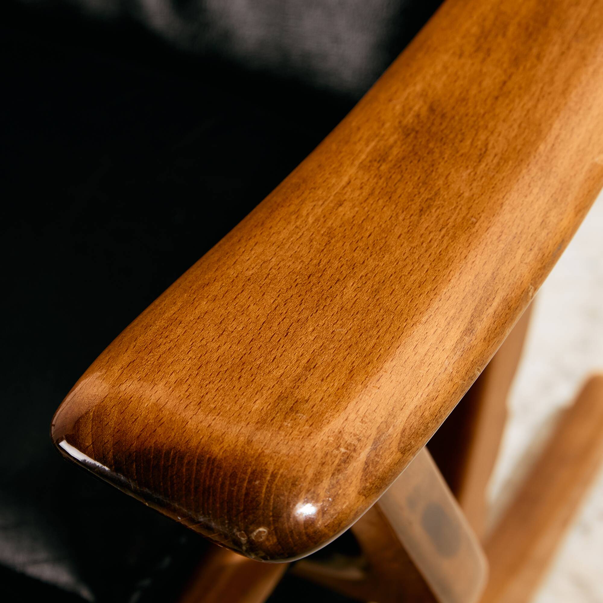 Beech armchair with leather upholstery