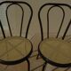 4 Black metal bistro chairs with plastic cane seat