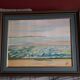 Old painting in oil on canvas depicting a seaside.