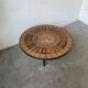 Capron “herbarium” coffee table with metal base