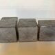 Trio of square candlesticks in veined marble