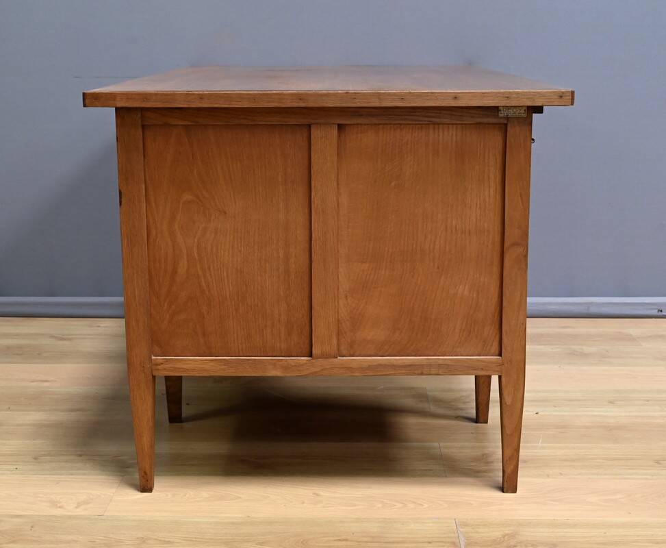 Solid oak pedestal desk, Régy establishments – 1940