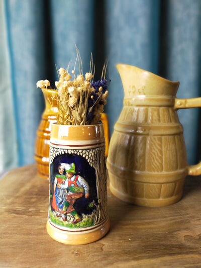 Two pitchers and a small original king beer mug