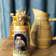 Two pitchers and a small original king beer mug