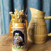 Two pitchers and a small original king beer mug