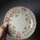 Short antique Longchamp stand with polychrome daisies in earthenware.