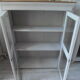 Showcase, bookcase, vintage pearl grey patinated cupboard, wooden top.