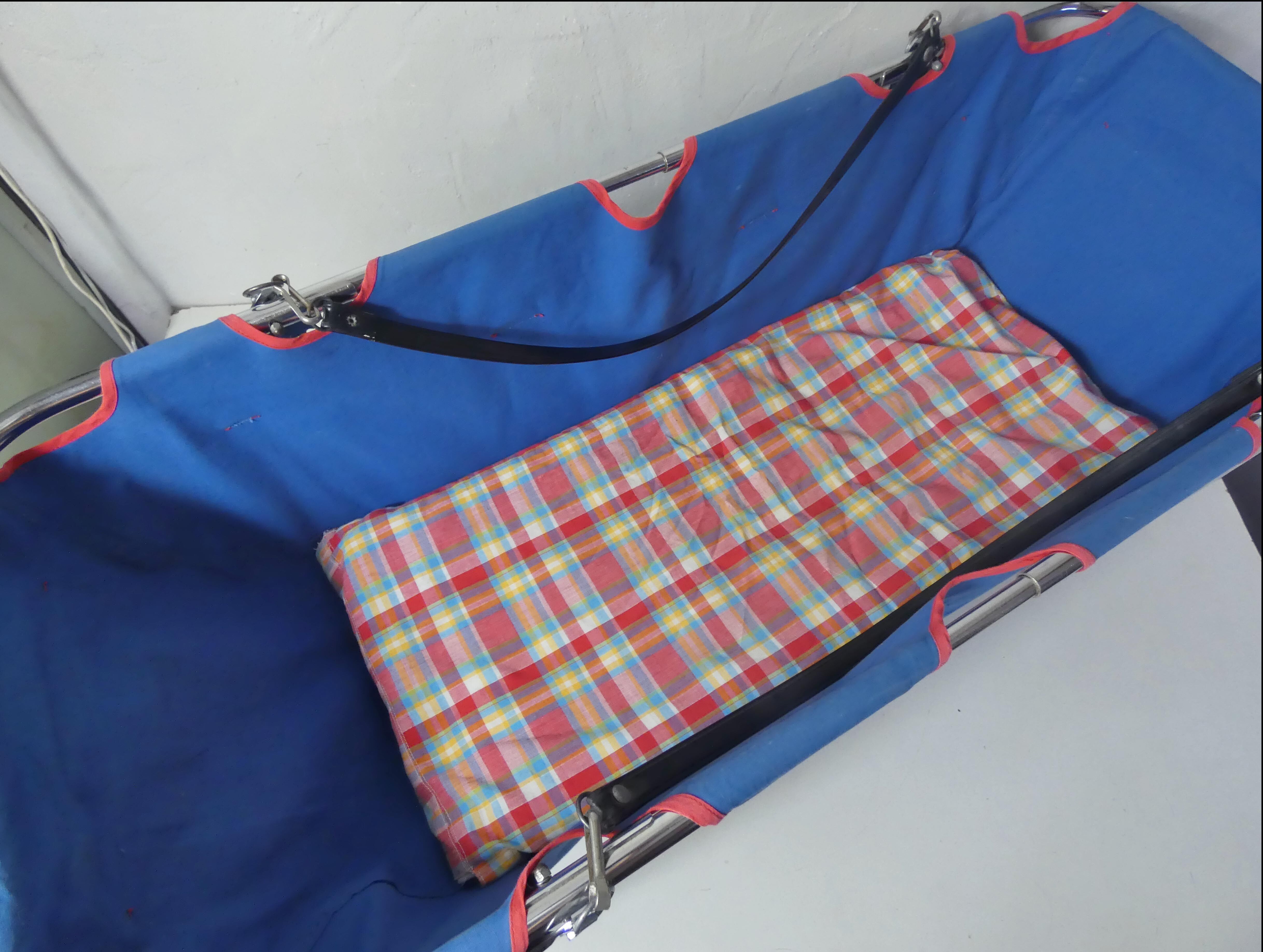 Folding travel cuffin