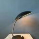 Small black metal desk lamp in Bauhaus style.