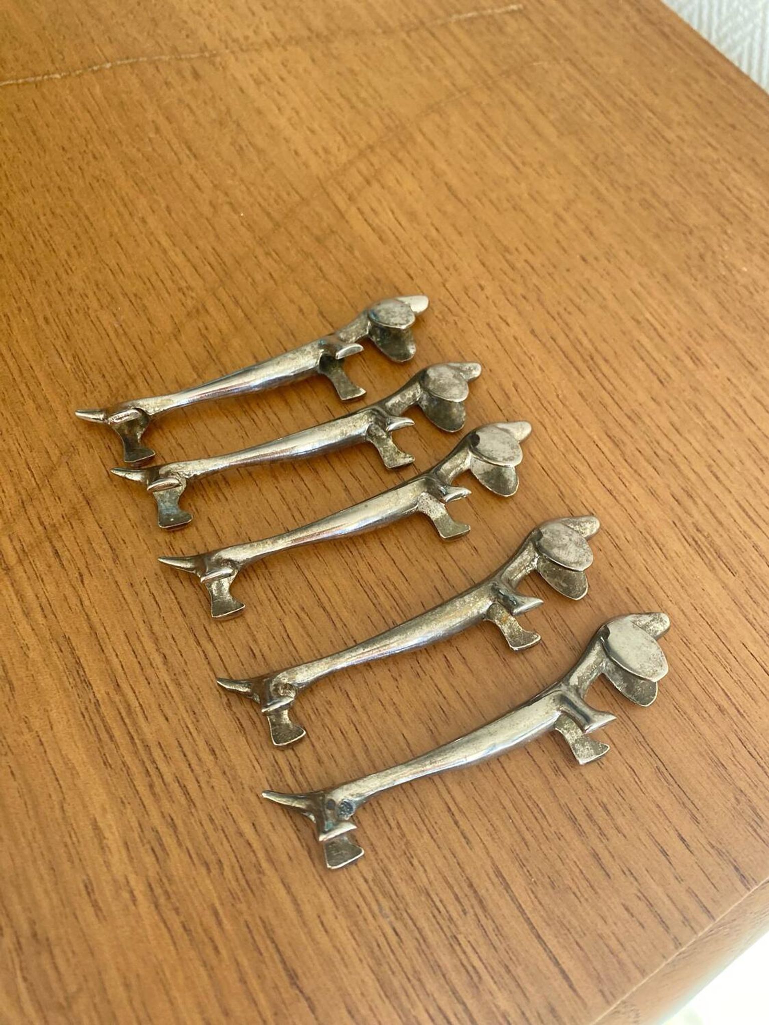 Vintage silver-plated dog knife rests