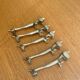 Vintage silver-plated dog knife rests