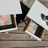 Pair of vintage bedside tables with high compass legs and top design