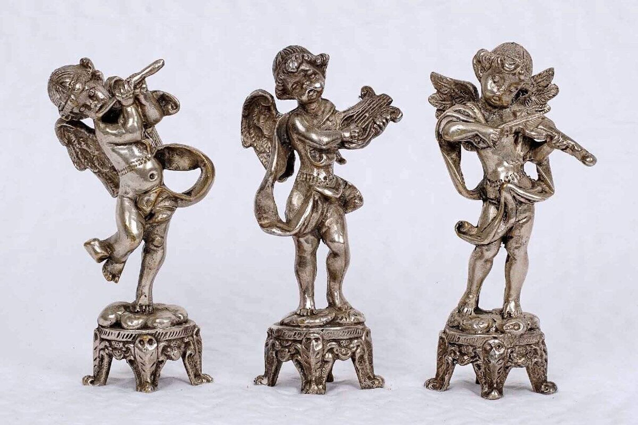Set of three musician cherubs in cast lead - period: 20th century