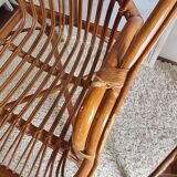 Pair of vintage rattan armchairs circa the 1970s.