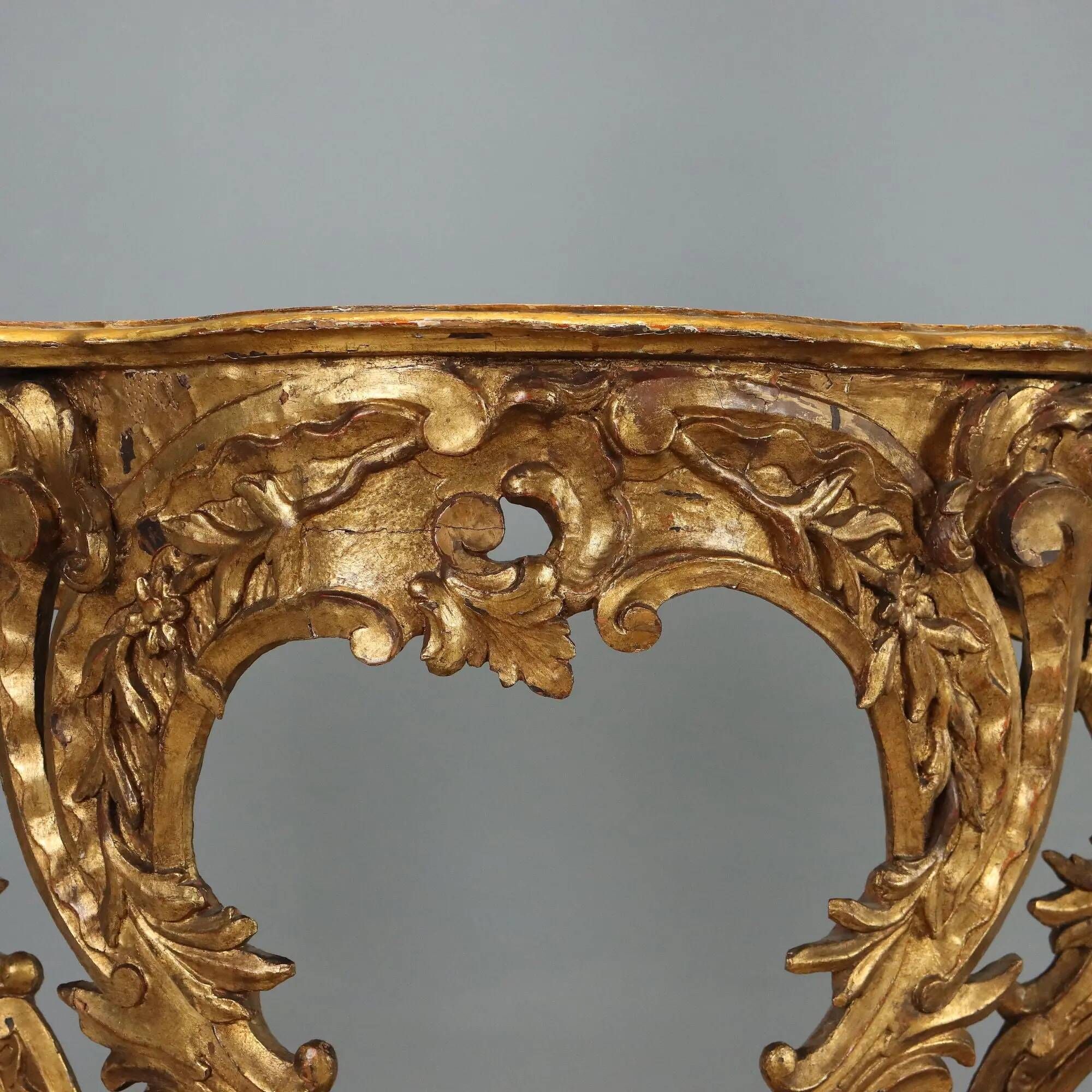 Old eclectic console carved in gilded fir, Italy 19th century