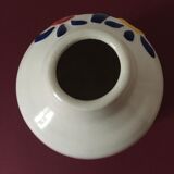 White porcelain vase created by Juan di Novita. Hand painted designs.