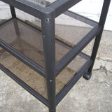 Rolling table serves 3 trays of smoked glass