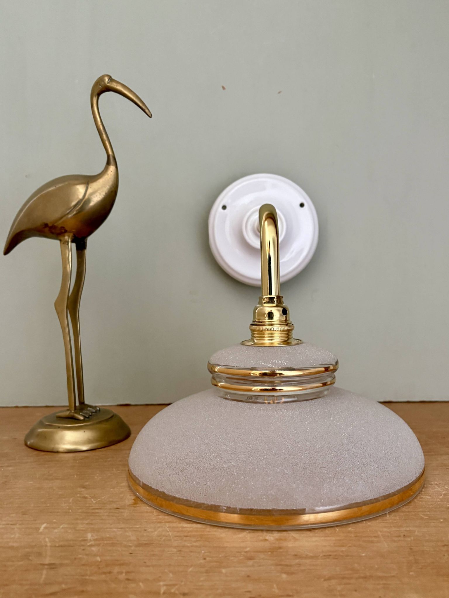 Vintage elbow wall lamp with white and gold granite glass shade