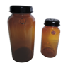 2 glass and bakelite pharmacy jars