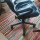 Two black leather armchairs
