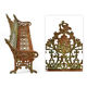 Sculpted cast iron bench with green patina