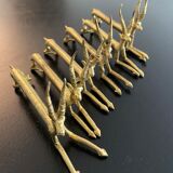 6 brass antelope-shaped knife holders