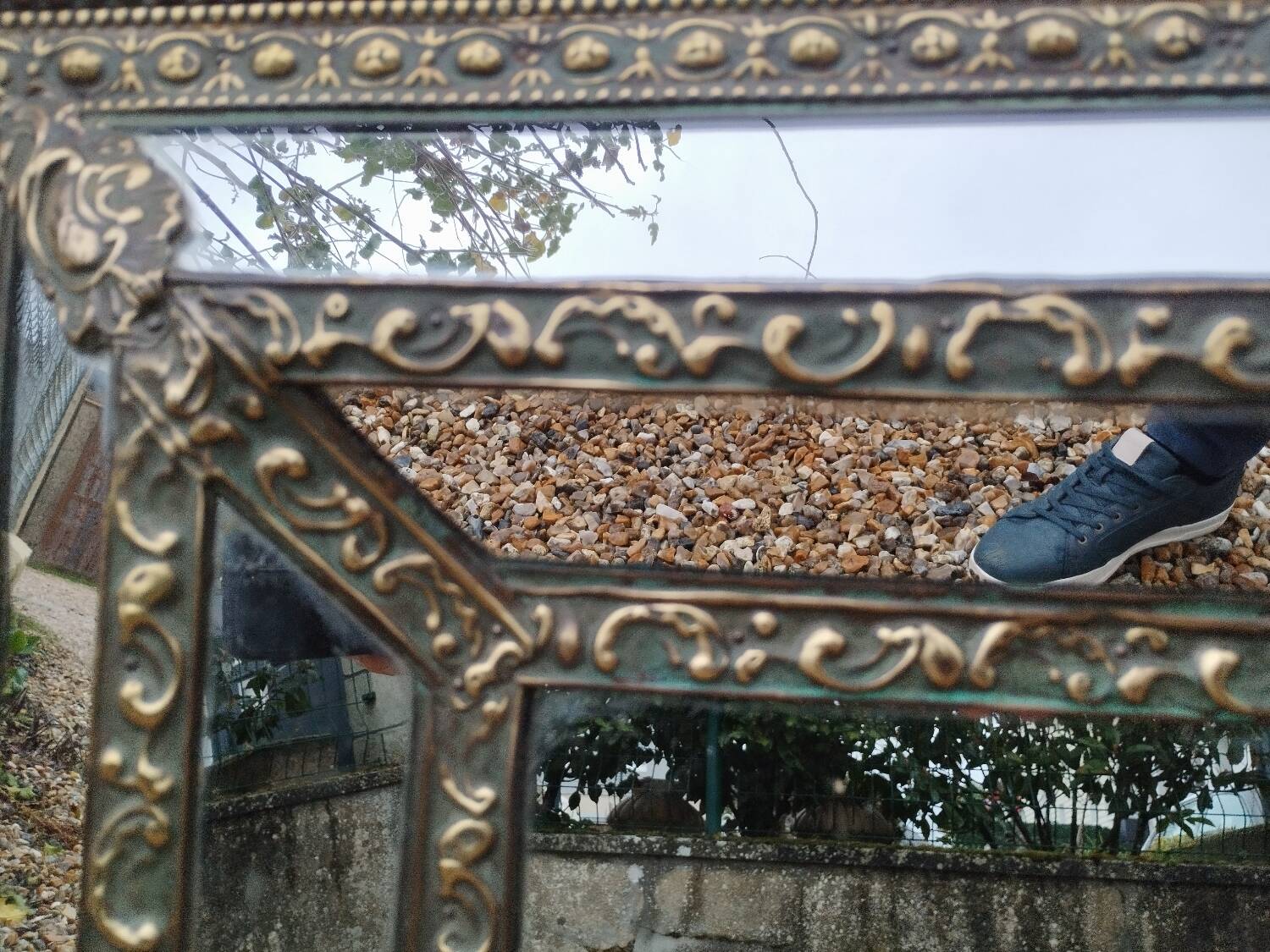Antique mirror with copper moulding.