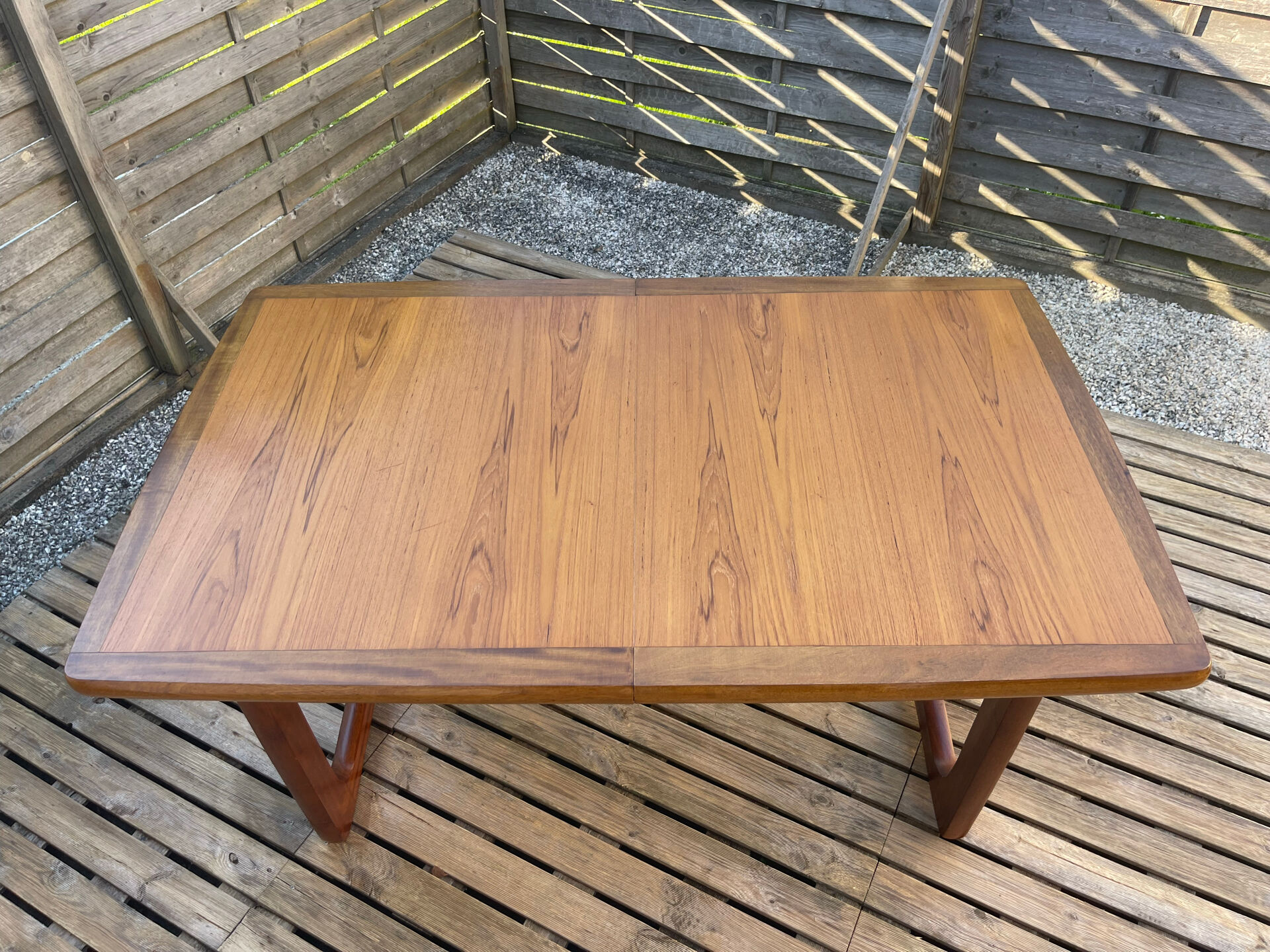 Extendable teak table, sled base, vintage style.