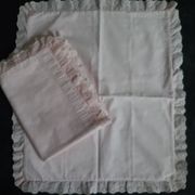 Old baby bed linen adornment