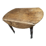 Round console table with folding shutters on copper wheels