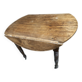 Round console table with folding shutters on copper wheels