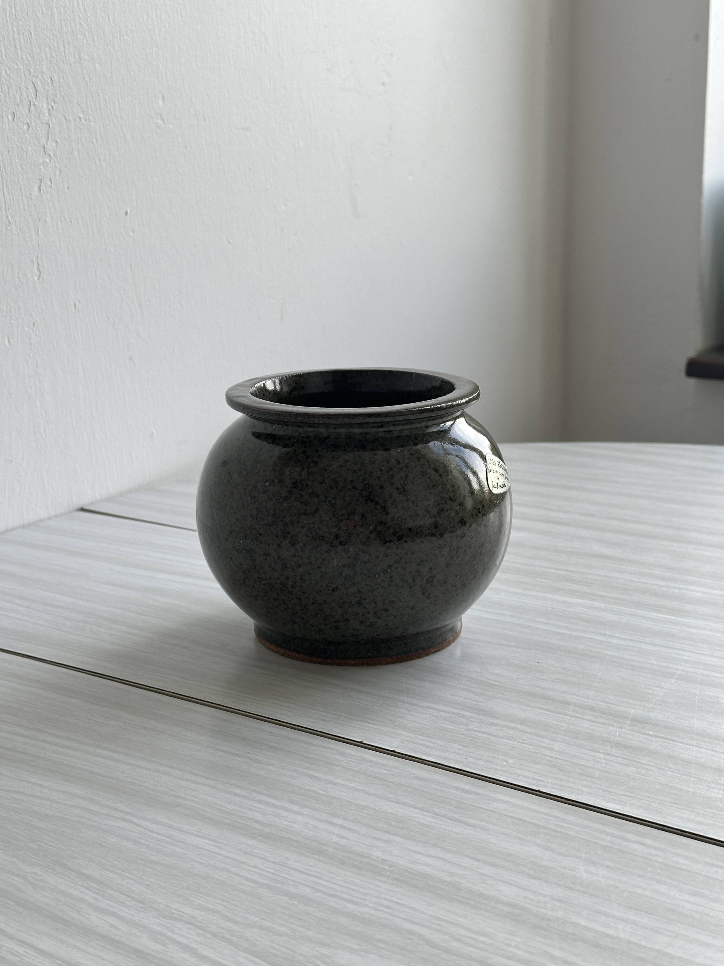 Vase - stoneware pot holder.