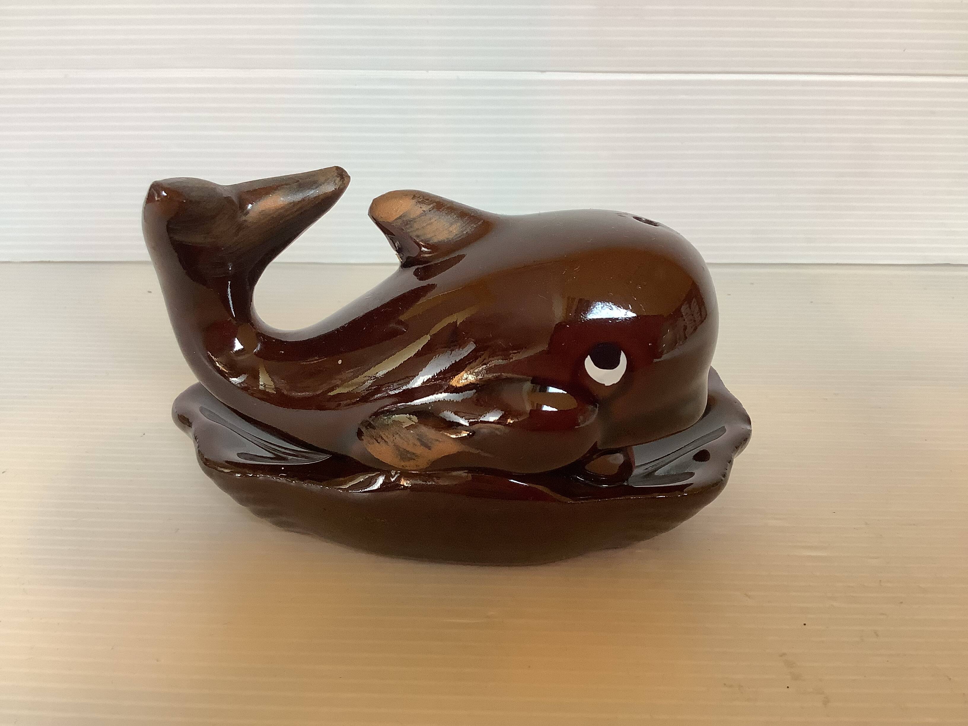 Whale-shaped pocket ashtray