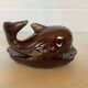 Whale-shaped pocket ashtray
