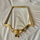 Antique Deknudt mirror in golden resin - 70 x 34 cm