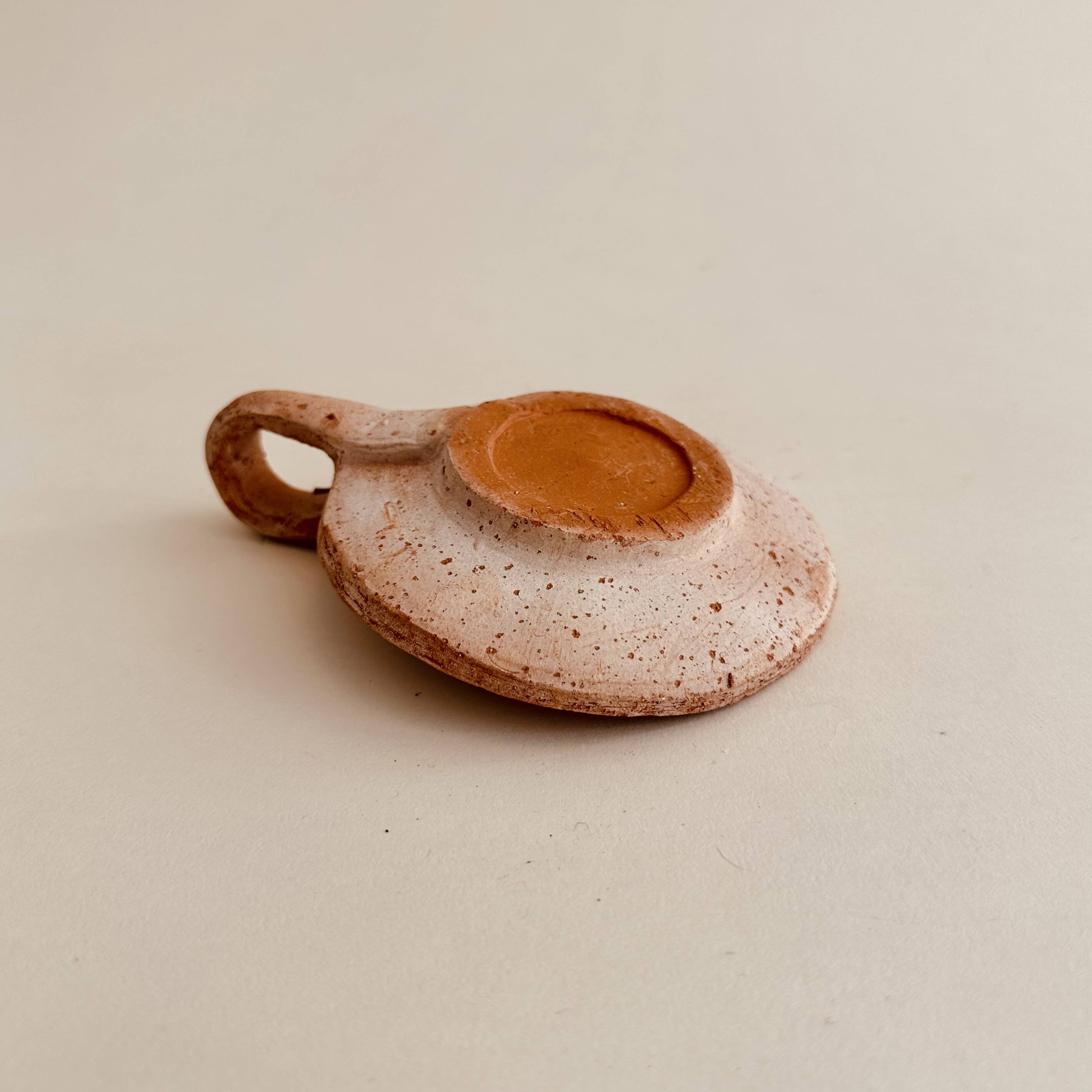 Terracotta candle holder