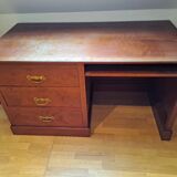 Solid cherry wood desk with 1 block and 3 drawers.