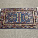 Small handmade wool Iranian rug.