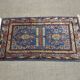 Small handmade wool Iranian rug.