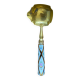 Ladle with earthenware reed