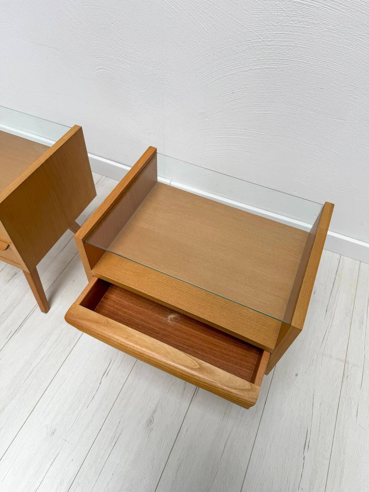 1960s vintage pair of mid-century walnut nightstands with glass shelves