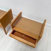 1960s vintage pair of mid-century walnut nightstands with glass shelves