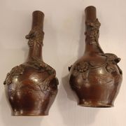 Pair of bronze soliflore vases. Japan, 19th century.